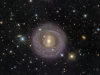 Chiêm ngưỡng NGC5701: Thiên hà thấu kính với dải sao kéo dài ở trung tâm cách Trái Đất hàng chục triệu năm ánh sáng