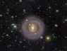 Chiêm ngưỡng NGC5701: Thiên hà thấu kính với dải sao kéo dài ở trung tâm cách Trái Đất hàng chục triệu năm ánh sáng