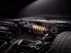 Tesla Roadster dùng vật liệu đặc biệt gì để giảm trọng lượng và hỗ trợ hệ thống đẩy?