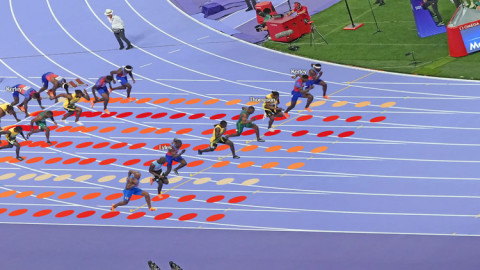 Làm thế nào 0,005 giây quyết định huy chương vàng Olympic 100m