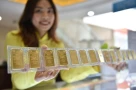 Vàng trong nước hôm nay tăng bất chấp thế giới giảm, nguyên nhân từ đâu?