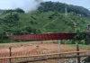 Cầu treo đứt cáp, ô tô chở 3 người rơi thẳng xuống sông