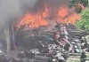 Hiện trường tan hoang vụ cháy bãi xe khiến hàng trăm phương tiện trơ khung ở gần cầu Vĩnh Tuy, Hà Nội