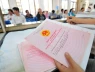 Vì sao người dân ở một số phường Hà Nội phải photo sổ đỏ nộp cho phường?