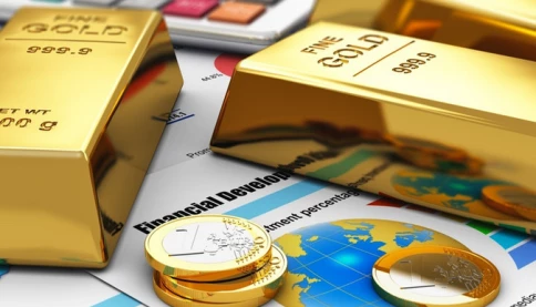 Vì sao giá vàng thế giới bật tăng sau khi Fed hạ lãi suất 0,25 điểm phần trăm?