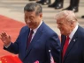 Hình ảnh thân mật giữa ông Trump và ông Tập trong lễ đón tại Bắc Kinh gây chú ý