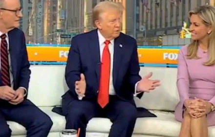 Tại sao có tấm vải sẫm màu lót dưới chỗ ông Trump ngồi?