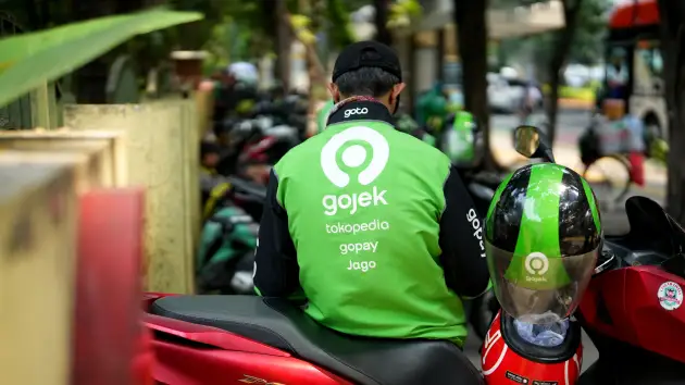 Công ty mẹ Gojek lên tiếng vụ sáp nhập với Grab