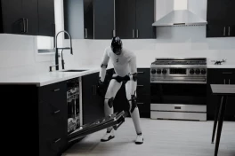 Ngỡ ngàng với robot hình người của Mỹ biết làm việc nhà với tư duy như con người: dùng chân đá máy rửa bát, lắc hông đóng ngăn kéo mượt mà