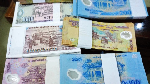 Cảnh báo nóng dịp Tết Bính Ngọ 2026: Đổi tiền mới trái phép có thể bị phạt tới 40 triệu đồng và tịch thu toàn bộ tang vật